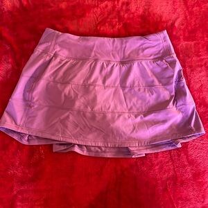 Purple lululemon shirt with built in shorts 
Size 4 
Perfect condition